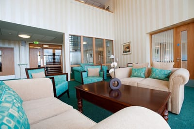 Cozy lounge area with seating and decor