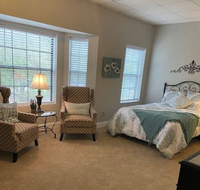 Cozy resident bedroom with natural light