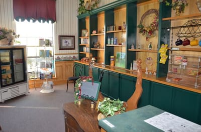 Interior view of a common area with shelves and seating