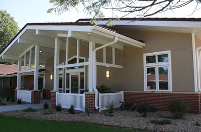 Exterior view of Rotary Senior Living with landscaping