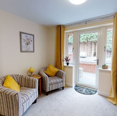 Cozy interior of a resident room with two chairs
