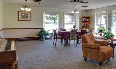 Bright common area with seating and plants