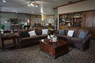 Interior of a cozy common area with seating and decor