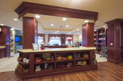Interior view of a common area with shelves and seating