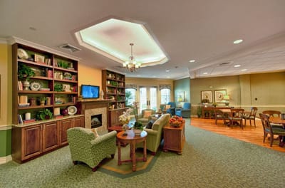 Interior common area with seating and bookshelves