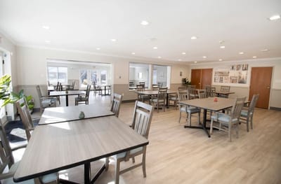 Bright dining room with tables and chairs