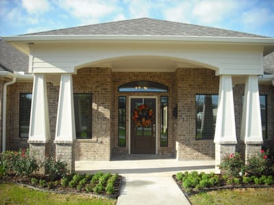 Exterior view of the facility entrance with landscaping