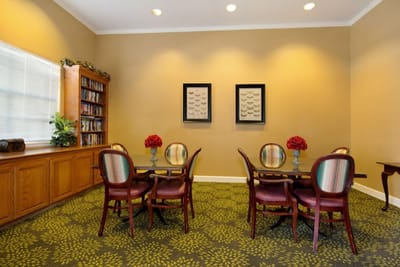 Bright common area with tables and chairs
