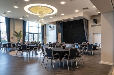 Interior of a common area with round tables