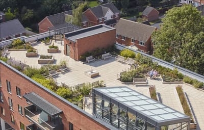 Aerial view of an outdoor garden space with seating