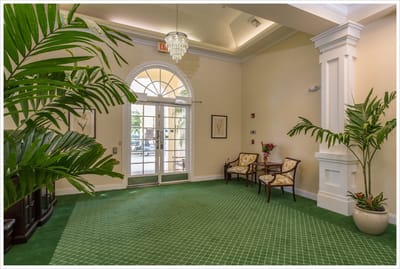 Bright interior lobby with seating and plants
