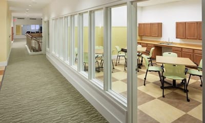 Interior view of a common area with tables and chairs