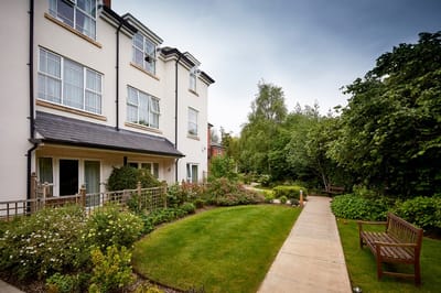 Exterior view of South Lodge with garden