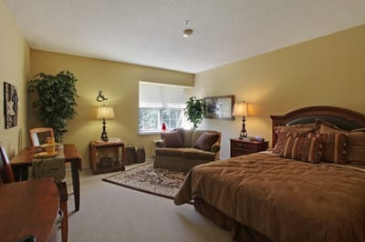 Cozy resident room with warm lighting and comfortable furniture
