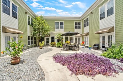 Outdoor courtyard with seating and plants