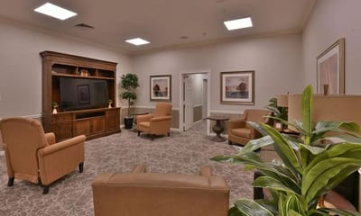 Bright common area with seating and decor
