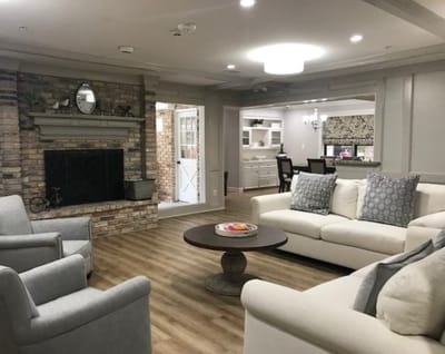 Cozy common area with seating and a fireplace