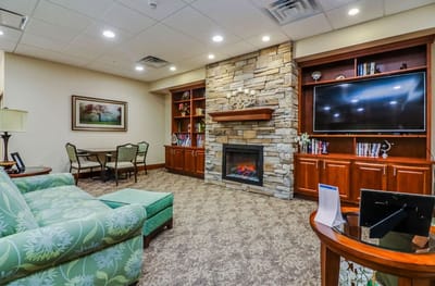 Common area with a cozy seating arrangement and fireplace