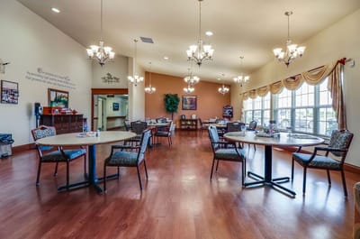 Interior view of a common area with tables and chairs