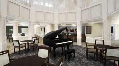 Interior view of a bright common area with a piano