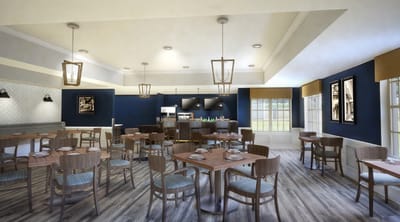 Dining area with tables and chairs in a bright setting