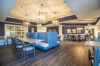 Brightly lit dining area with comfortable seating