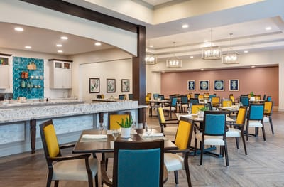 Bright dining room with elegant decor and seating