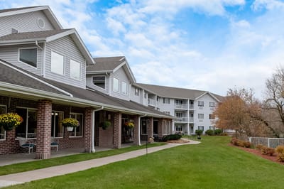 Exterior view of StoryPoint facility with garden