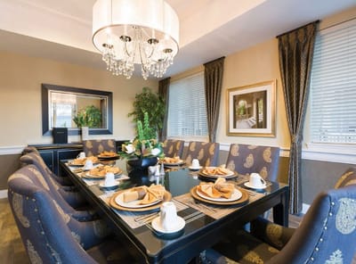 Elegantly set dining room with a large table