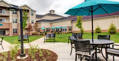 Outdoor seating area with umbrellas at the facility