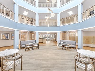 Bright common area with seating and natural light
