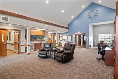 Bright common area with comfortable seating in the facility