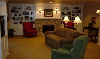 Interior common area with seating and bookshelves