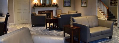 Cozy common area with seating and holiday decor