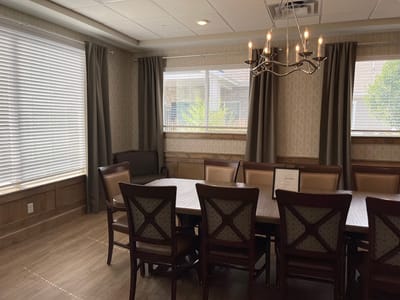Cozy common area with dining table and chairs