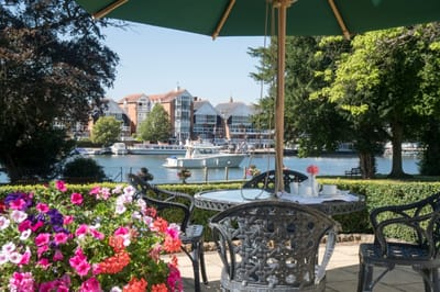 Outdoor seating overlooking a picturesque river view