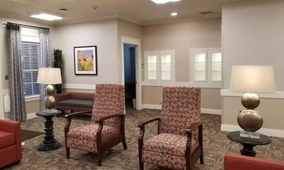 Bright common area with seating and artwork