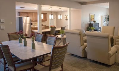 Interior common area with dining and seating arrangements