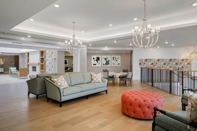 Bright interior common area with seating and decor
