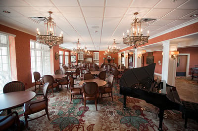 Elegant common area with tables and chairs