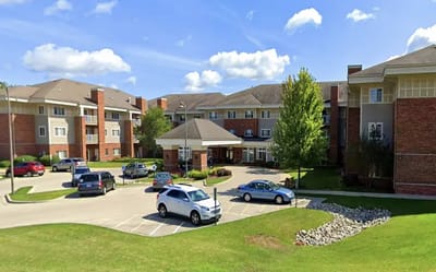 View of The Courtyard at McHenry's building and parking area