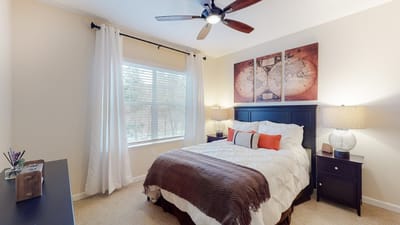 Cozy private room with a bed and decorative wall art