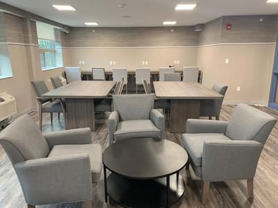 Comfortable common area with seating and tables