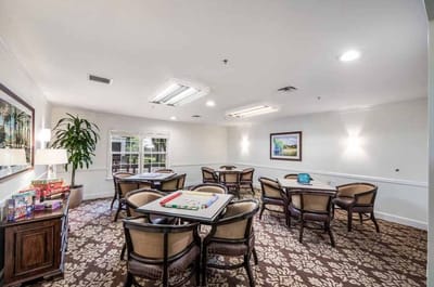Activity room with game tables and seating