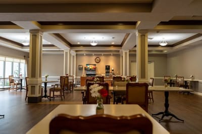 Interior view of a common area with dining tables