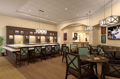 Interior dining area with a bar and seating
