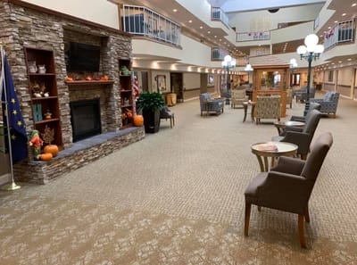 Common area with seating and fireplace