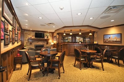 Cozy common area with tables and lounge seating