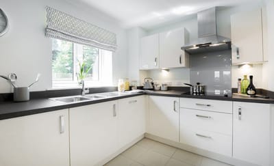 Bright kitchen area with modern appliances