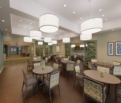Interior view of a cozy dining room with tables and chairs